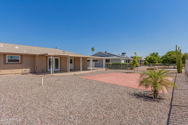 rear view of house with a patio area