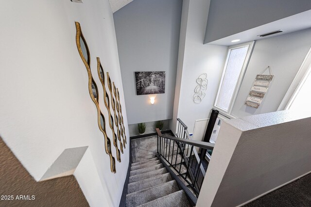6533 N 10th Pl, Phoenix, AZ 85014 - stairs featuring carpet floors and baseboards