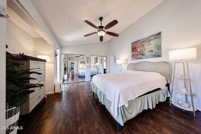 6533 N 10th Pl, Phoenix, AZ 85014 - bedroom with lofted ceiling, a textured ceiling, wood finished floors, radiator heating unit, and ceiling fan