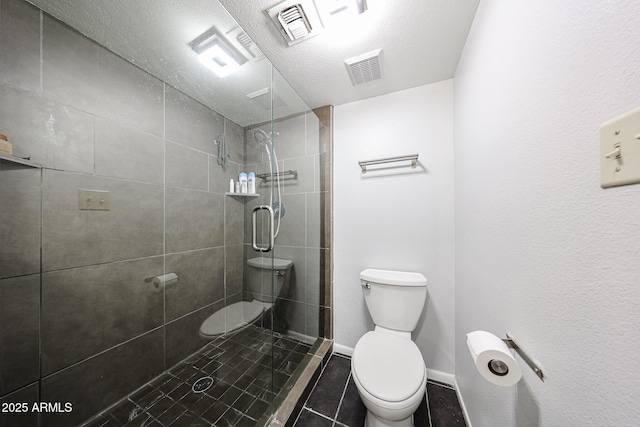6533 N 10th Pl, Phoenix, AZ 85014 - full bath with toilet, a tile shower, and tile patterned floors