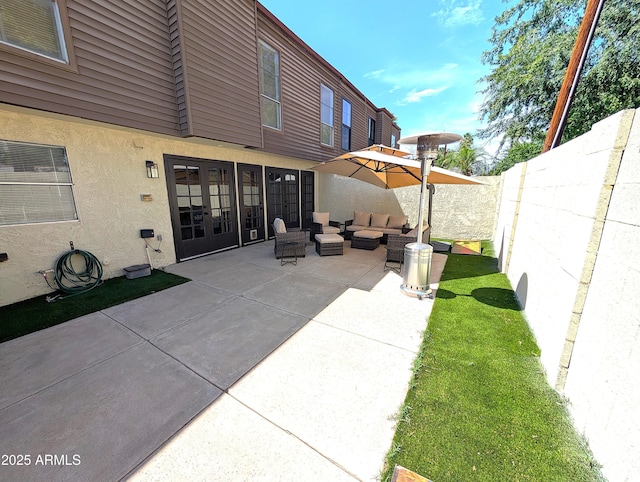 6533 N 10th Pl, Phoenix, AZ 85014 - fenced backyard featuring an outdoor hangout area and a patio