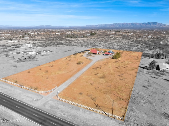 drone / aerial view featuring a mountain view