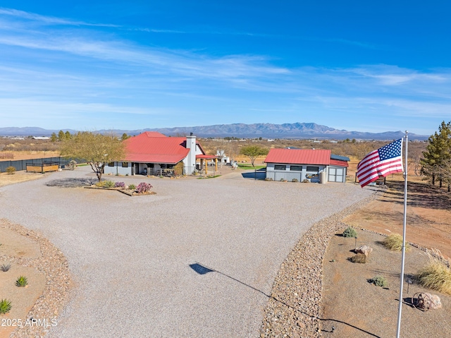 exterior space featuring a mountain view