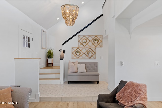 interior space with an inviting chandelier and light hardwood / wood-style flooring