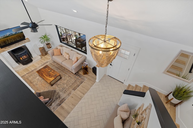 living room featuring light hardwood / wood-style floors and ceiling fan