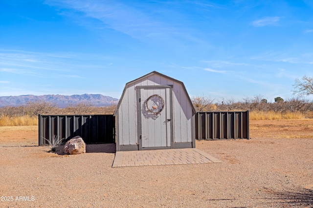 view of outdoor structure featuring a mountain view