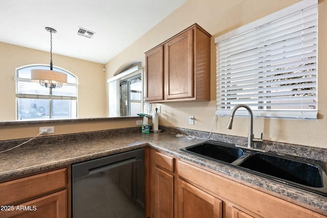 kitchen with sink, dishwasher, hanging light fixtures, and an inviting chandelier