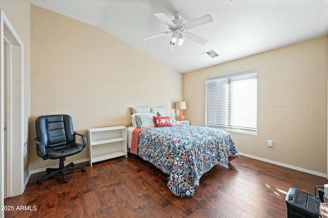 bedroom featuring ceiling fan, vaulted ceiling, and dark hardwood / wood-style floors