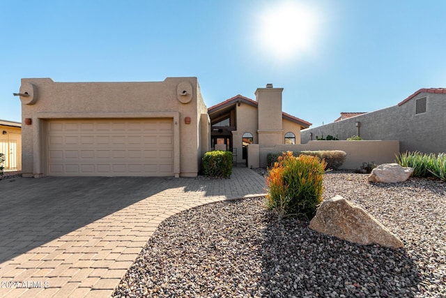 view of front of property featuring a garage