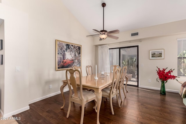 dining area with dark hardwood / wood-style flooring, high vaulted ceiling, and ceiling fan