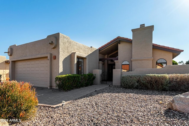 view of front of home featuring a garage