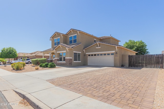 view of front of home with a garage