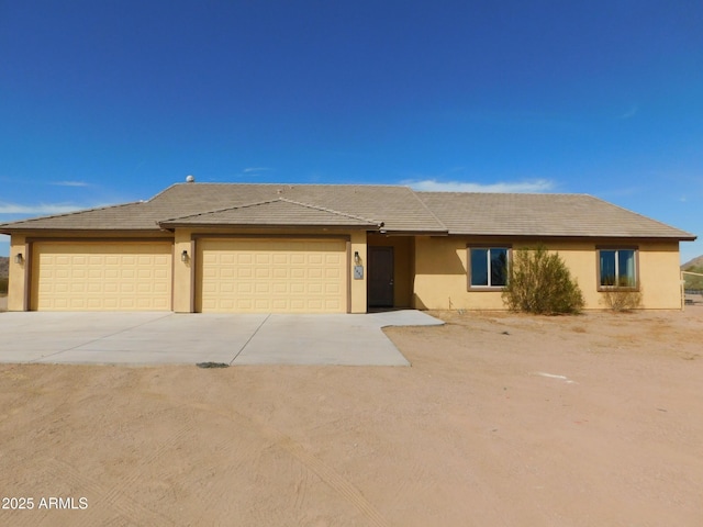 view of front of property with a garage