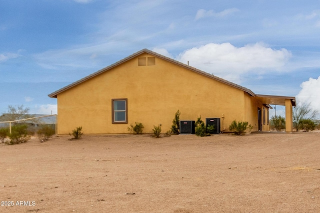 view of property exterior with cooling unit