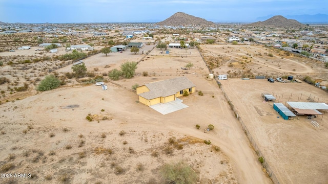 drone / aerial view featuring a mountain view