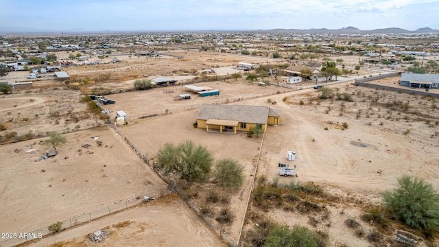 birds eye view of property featuring a mountain view