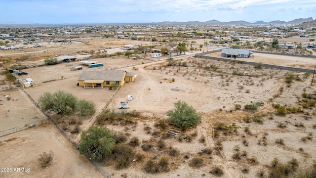 drone / aerial view featuring a mountain view