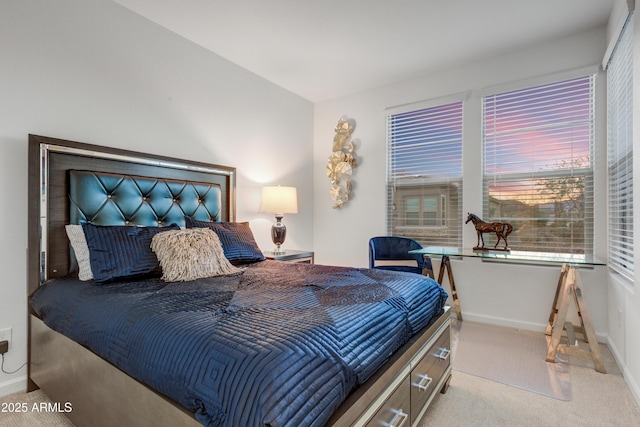 bedroom featuring light colored carpet