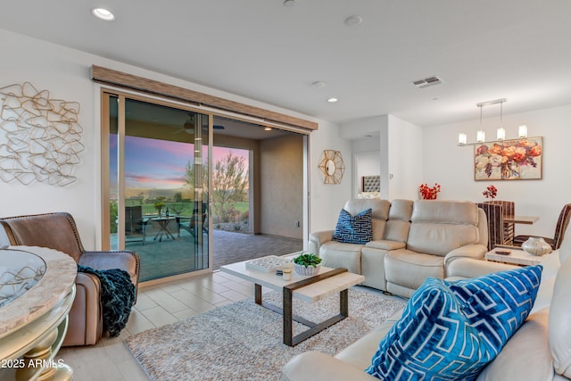 living room with a chandelier