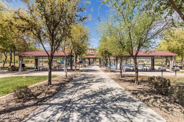 surrounding community with playground community and a gazebo