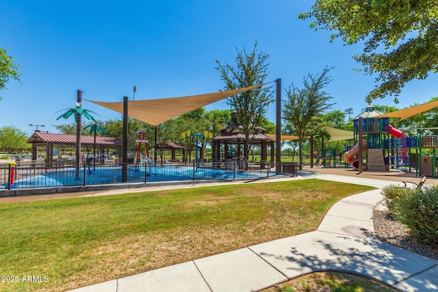 communal playground with a yard and a gazebo