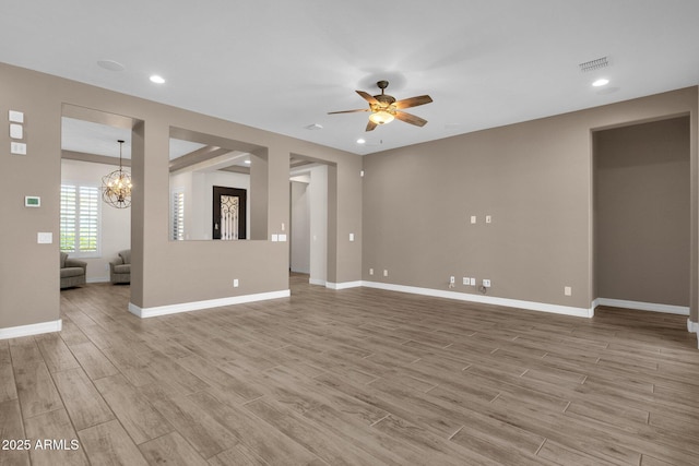 10350 E Texas Ave, Mesa, AZ 85212 - unfurnished living room featuring ceiling fan, light wood-style flooring, recessed lighting, baseboards, and a chandelier