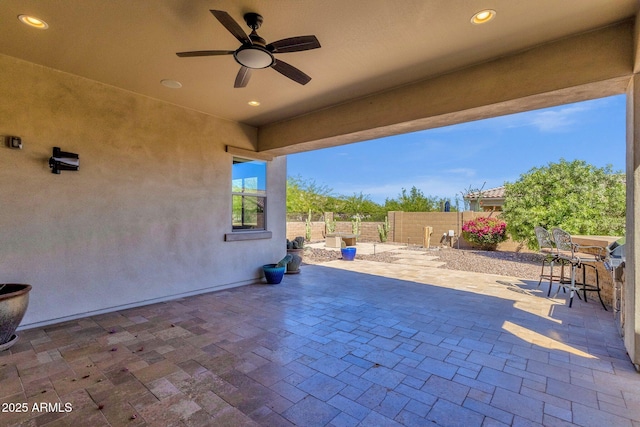 10350 E Texas Ave, Mesa, AZ 85212 - view of patio / terrace with a ceiling fan and fence