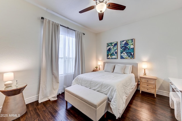 bedroom with baseboards, wood finished floors, and ceiling fan