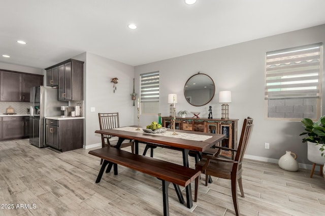 dining room with light hardwood / wood-style flooring