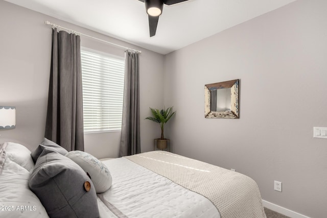 bedroom featuring ceiling fan and carpet floors