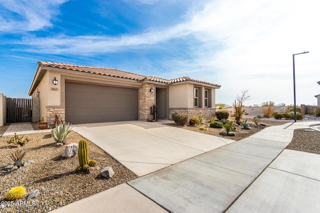 view of front of property with a garage