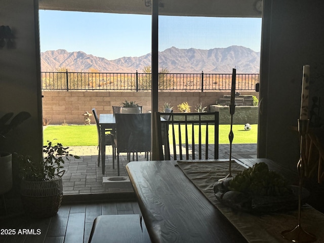 doorway featuring plenty of natural light, a mountain view, and hardwood / wood-style floors