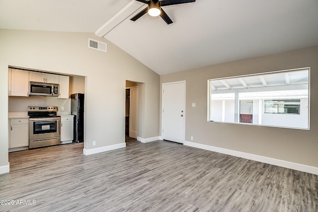 unfurnished living room with beam ceiling, light wood-type flooring, ceiling fan, baseboards, and high vaulted ceiling