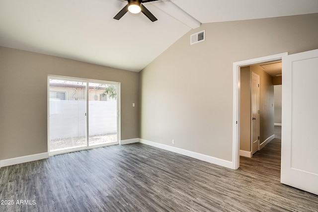spare room with dark wood finished floors, a ceiling fan, and baseboards