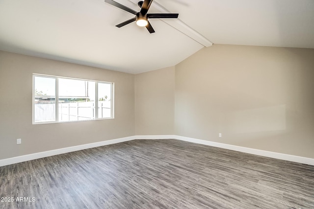 unfurnished room featuring ceiling fan, wood finished floors, and baseboards