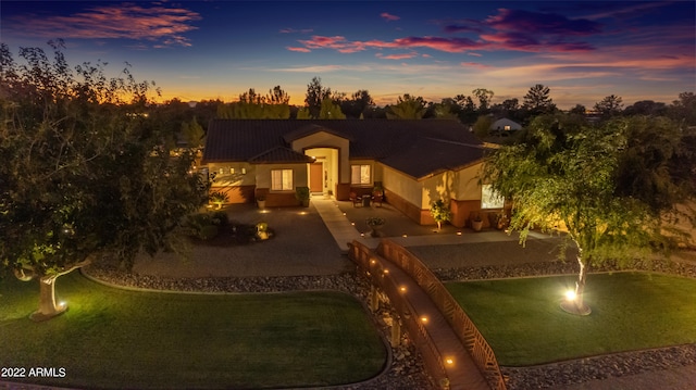 view of front of property featuring a patio