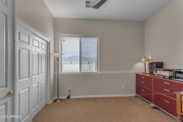 bedroom featuring a closet, ceiling fan, and carpet flooring