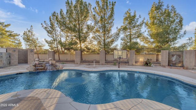 view of pool featuring pool water feature