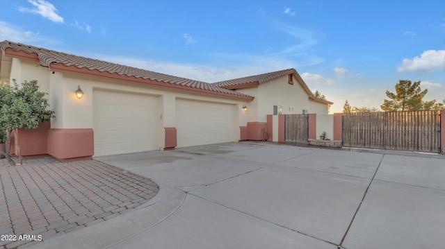 view of side of property with a garage