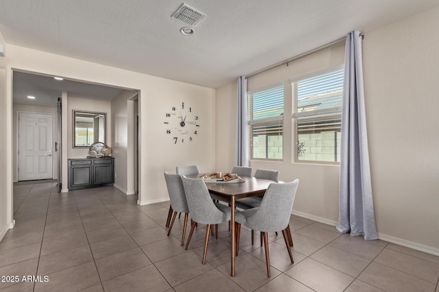 view of tiled dining space