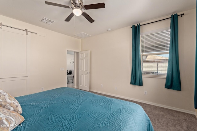 bedroom with ceiling fan and carpet flooring