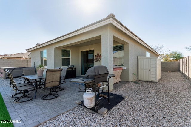 rear view of property with a patio