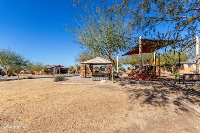 view of yard featuring a playground and a gazebo