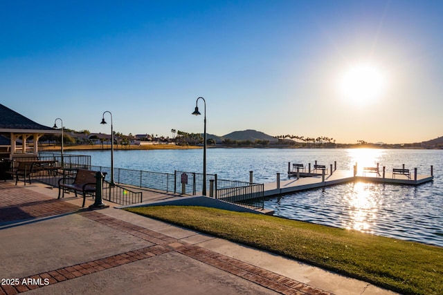 dock area with a water view