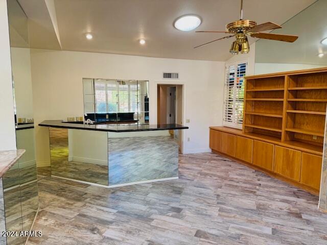 kitchen featuring ceiling fan