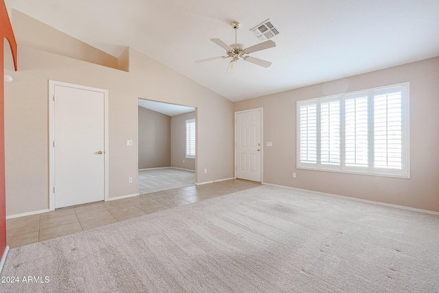 7275 W Tina Ln, Glendale, AZ 85310 - carpeted spare room with ceiling fan, tile patterned flooring, and vaulted ceiling
