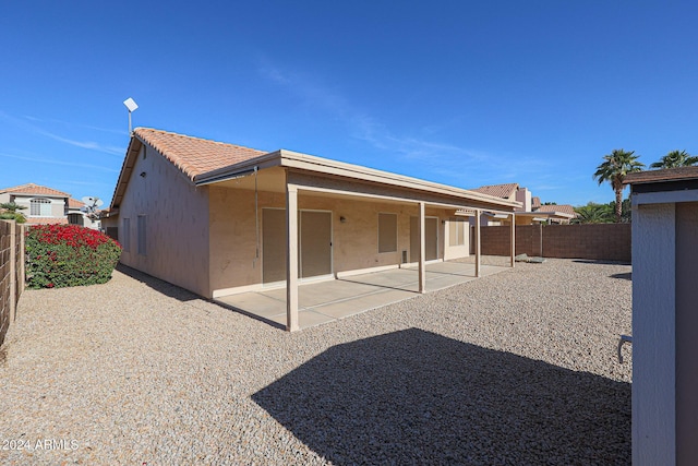 back of house featuring a patio