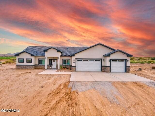 view of front of property with a garage