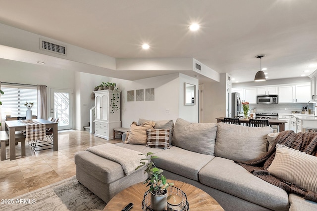 living room featuring sink