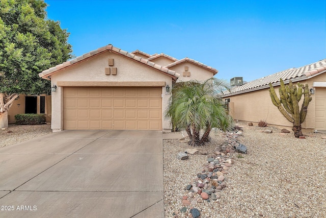 view of front of property with a garage and central AC unit